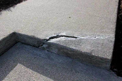 Concrete crack repair and surface restoration