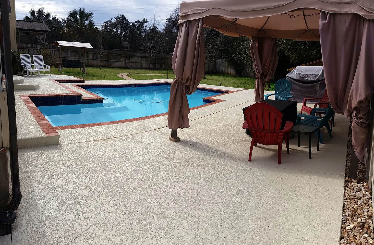kool deck pool surface with brick accents