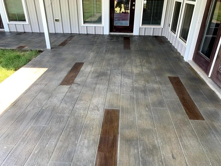 multi tone wood plank stamped concrete patio