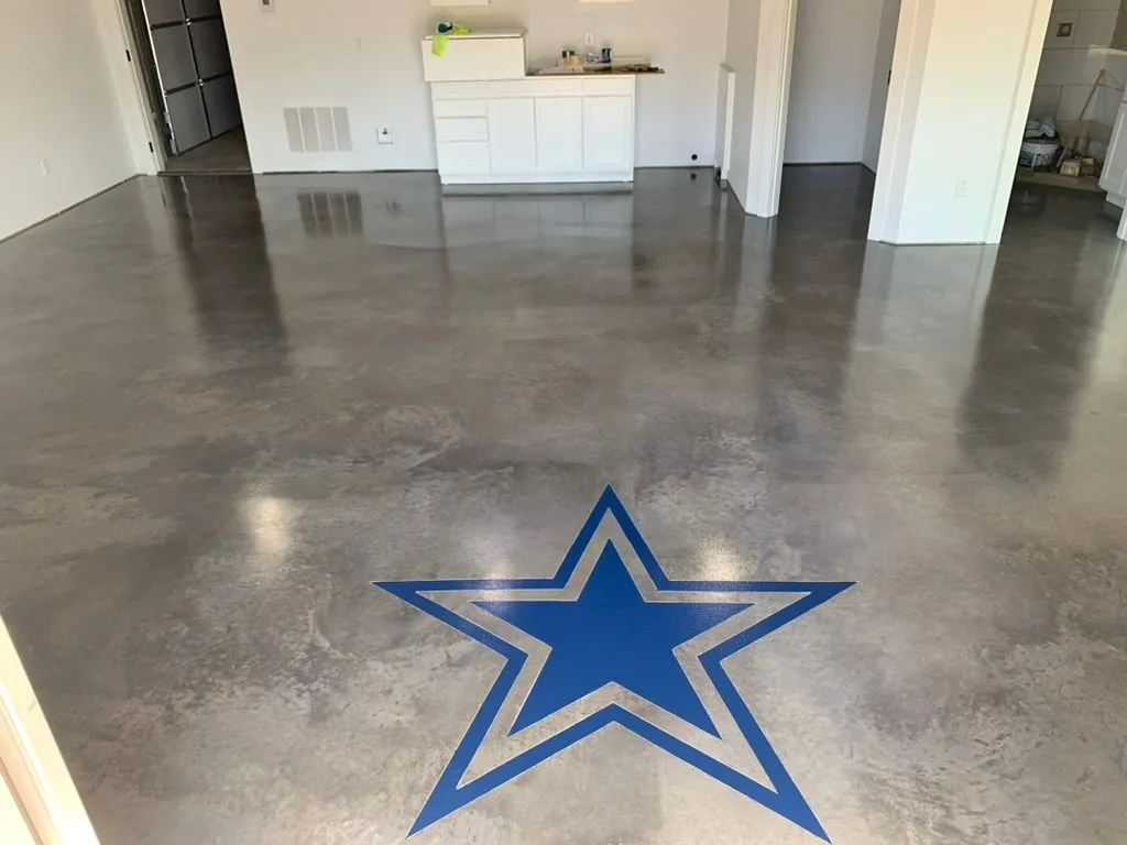 polished concrete floor with cowboys logo