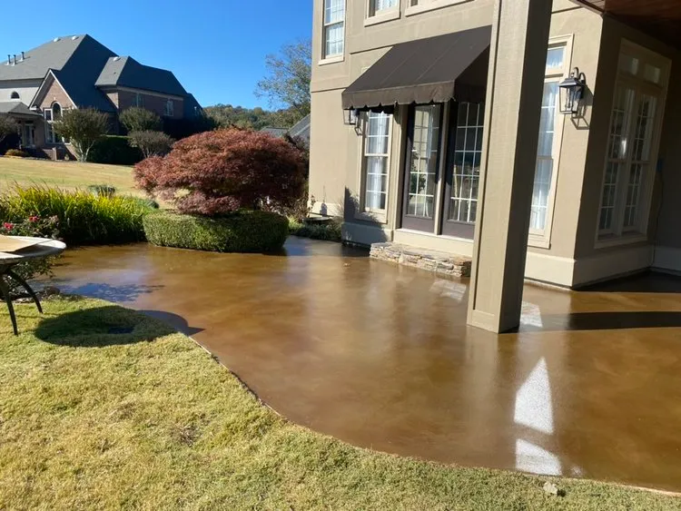 stained concrete patio with glossy finish